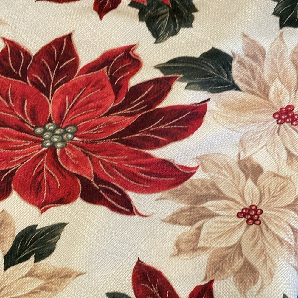 St. Nicholas Square round poinsettia tablecloth approximately 66 inche diameter